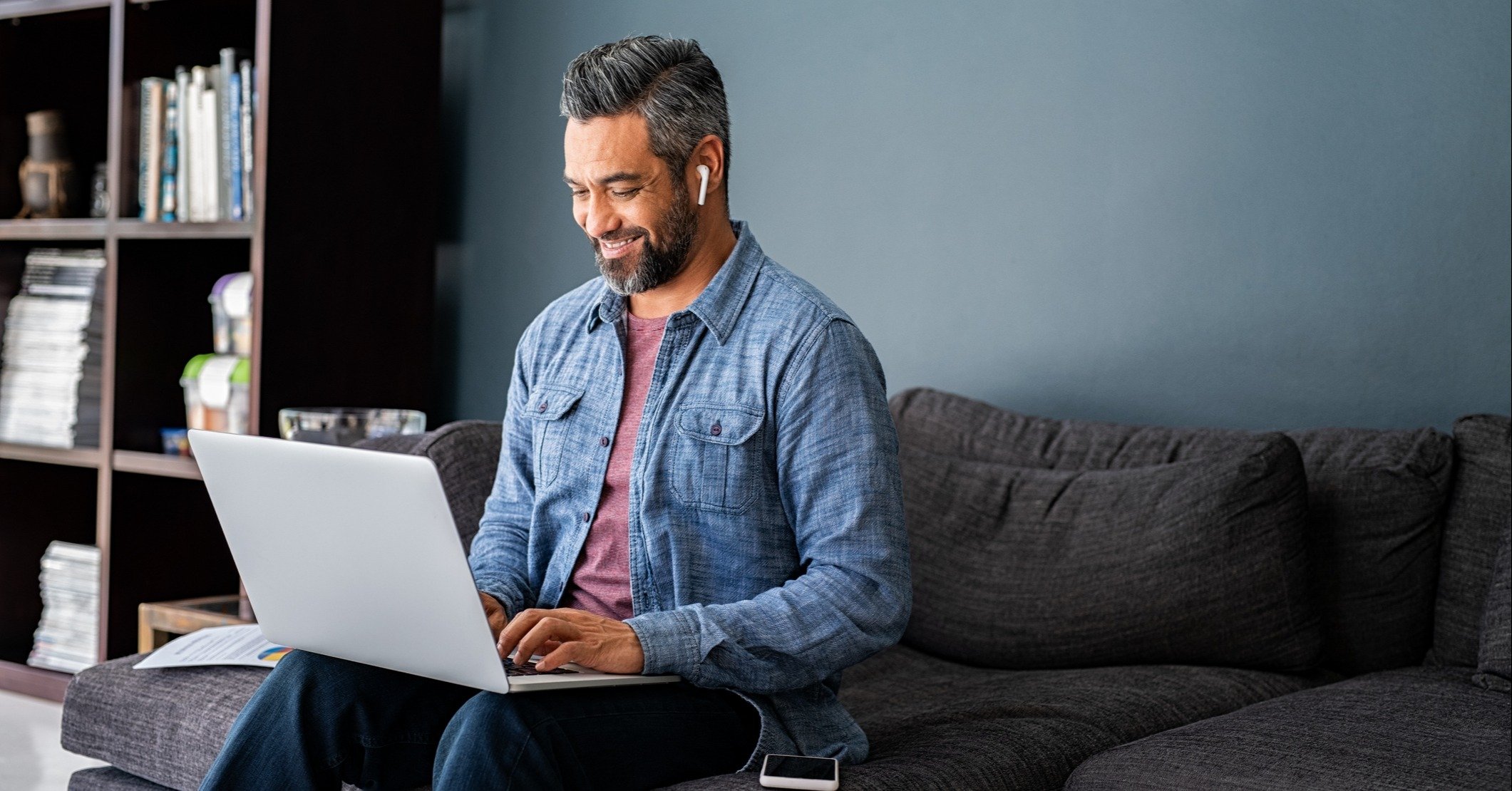 Man typing on laptop