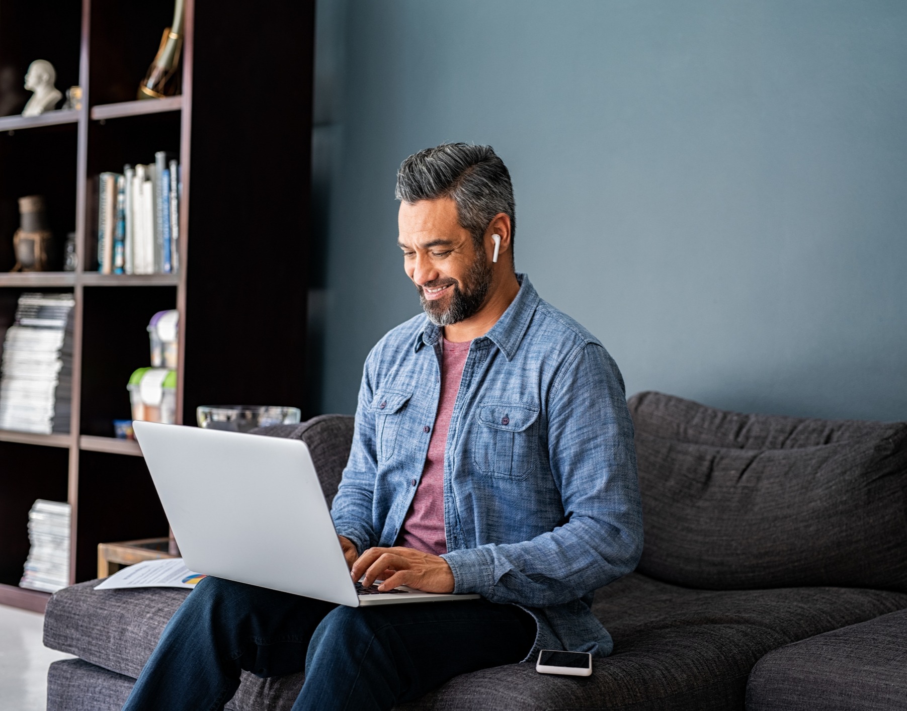 Man typing on laptop